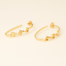 Half-Open Gold Oval Earrings with Diamond Cutouts