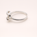 Adjustable Silver Ring with Zircon Knot - Elegant and Radiant